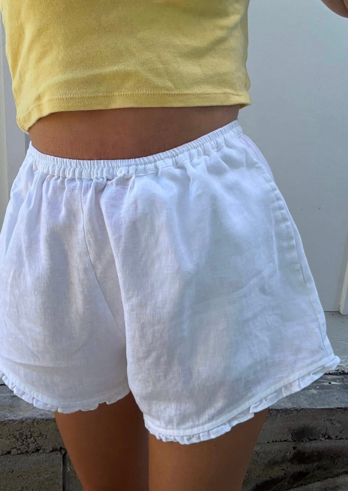 Ladies washed linen frill shorts (black pre order)