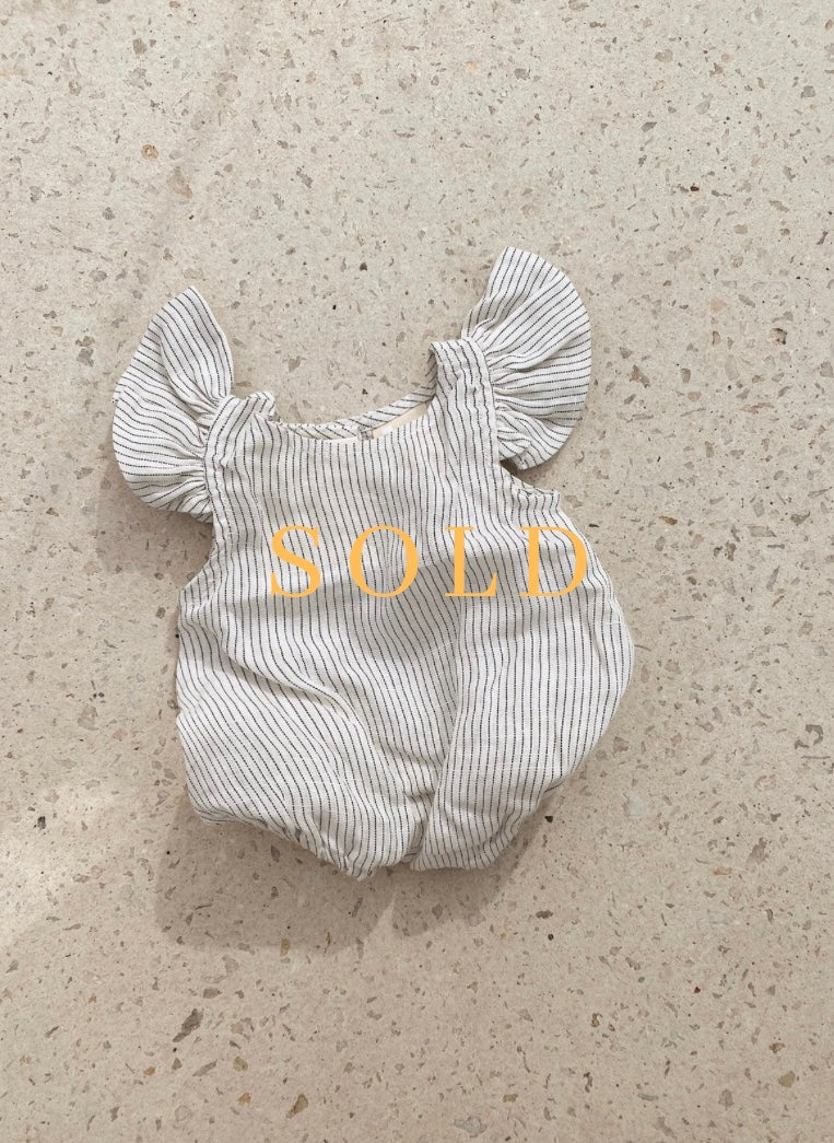 Pennon romper size 6-12 months (pre loved)