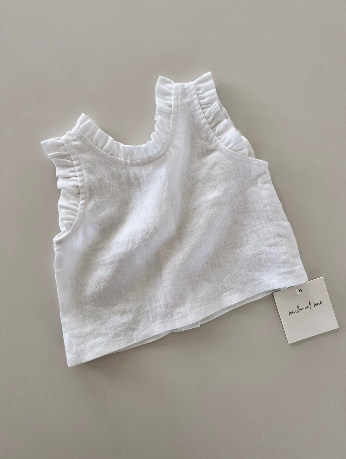 Frill singlet 6-12m (seconds)