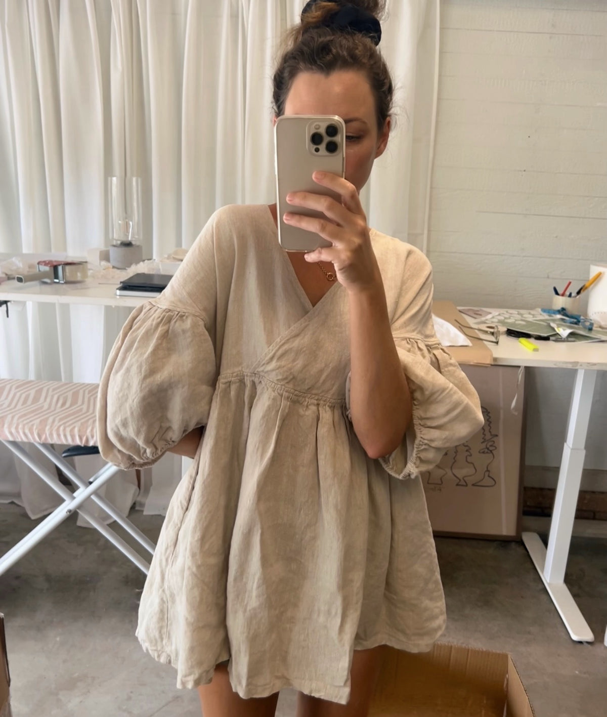 Person wearing a linen dress with pockets
